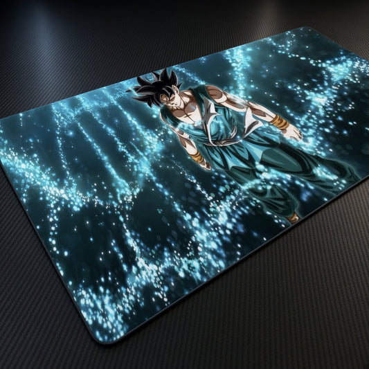Goku Ultra Instinct playmat at an angle on a gaming desk