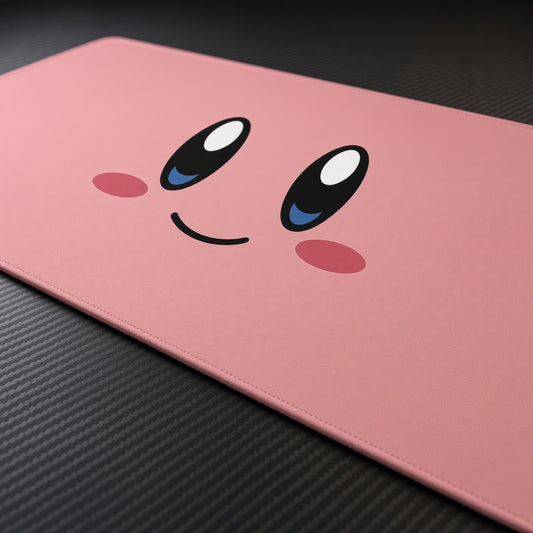 Kirby Star Warrior playmat at an angle on a gaming desk