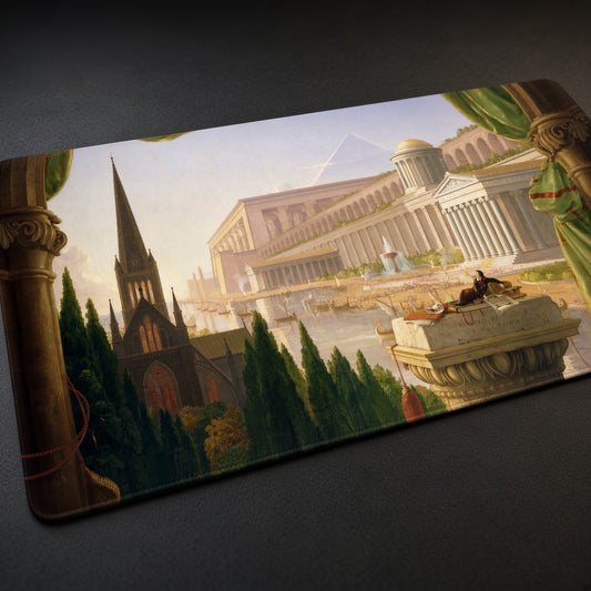 Architect’s Dream Thomas Cole Playmat at an angle on a gaming desk