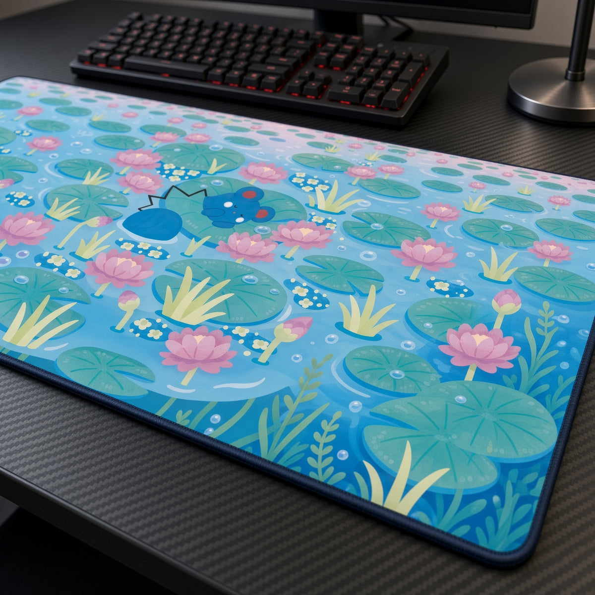 Azurill Lily Pond Pokémon Playmat at an angle with keyboard and mouse