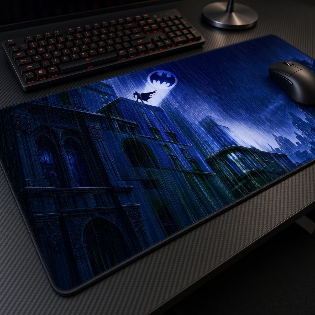 Batman Bat-Signal Gotham Rain DC Playmat at an angle on a gaming desk