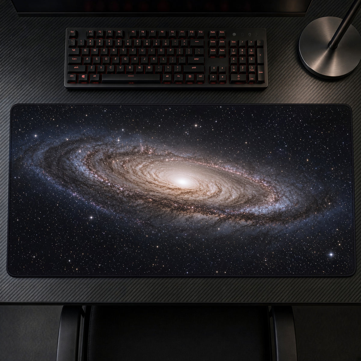 Blue Spiral Galaxy Stars Space Playmat on a gaming desk, top-down view