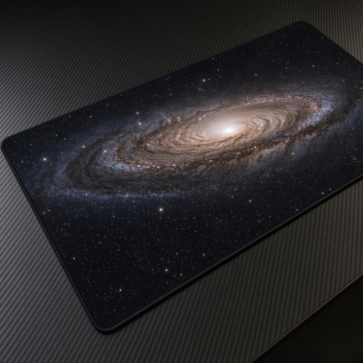Blue Spiral Galaxy Stars Space Playmat at an angle on a gaming desk