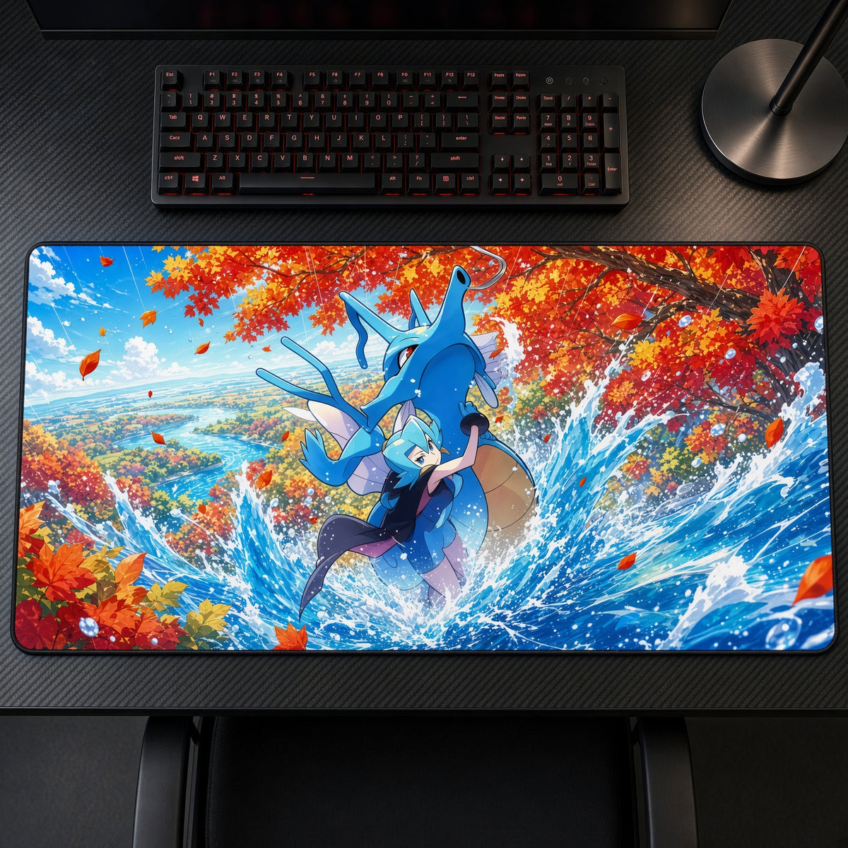 Clair & Kingdra Autumn Splash Pokémon Playmat on a gaming desk, top-down view