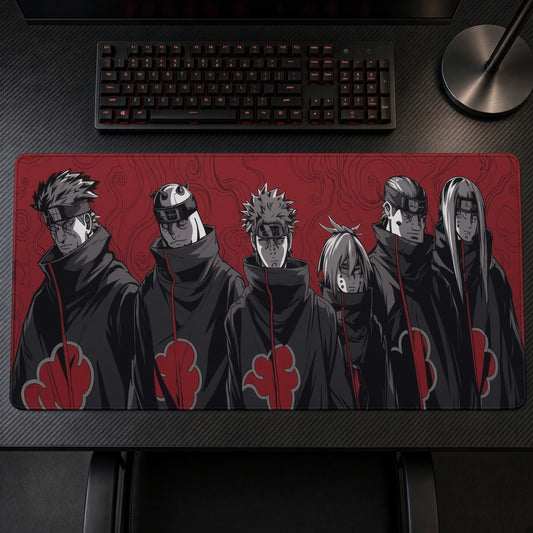 Naruto Akatsuki Dawn playmat on a gaming desk, top-down view