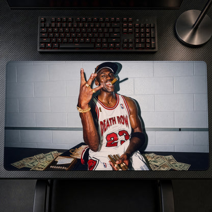 Death Row 23 Jersey Cash Portrait Playmat on a gaming desk, top-down view
