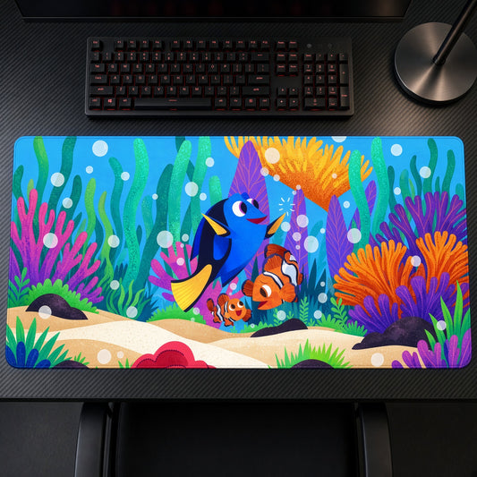 Dory and Nemo Coral Reef Finding Nemo Playmat on a gaming desk, top-down view