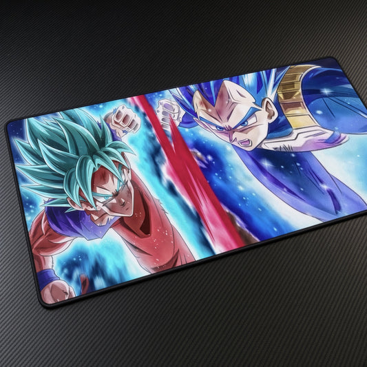 Goku & Vegeta Blue Surge playmat at an angle on a gaming desk