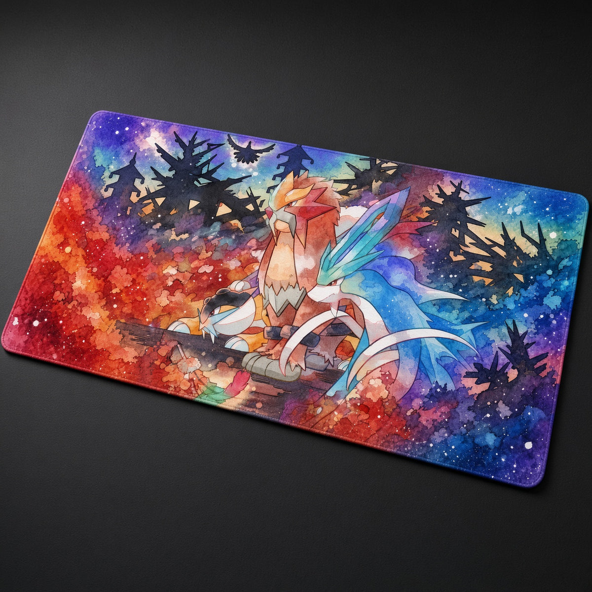 Entei, Raikou & Suicune Watercolor Forest Pokémon Playmat at an angle on a gaming desk