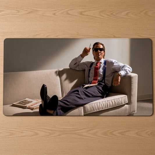 Executive Sunglasses Couch Pose Playmat at an angle on a gaming desk