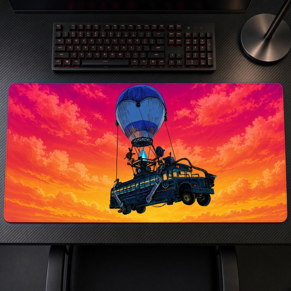 Fortnite Battle Bus Balloon Sunset Playmat on a gaming desk, top-down view