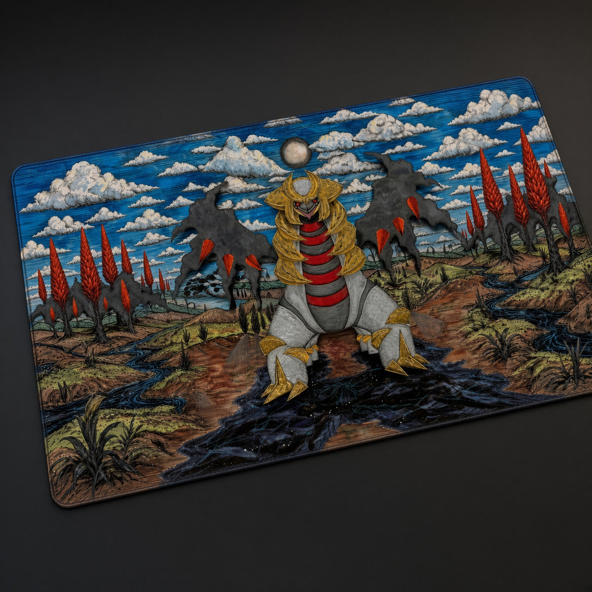 Giratina Full Art Pokémon Playmat at an angle on a gaming desk