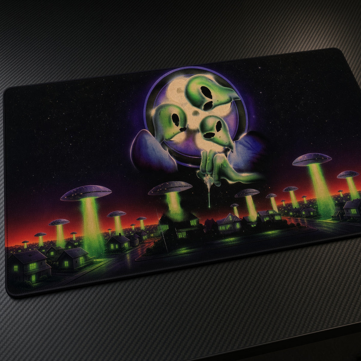 Green Aliens UFO Invasion Playmat at an angle on a gaming desk