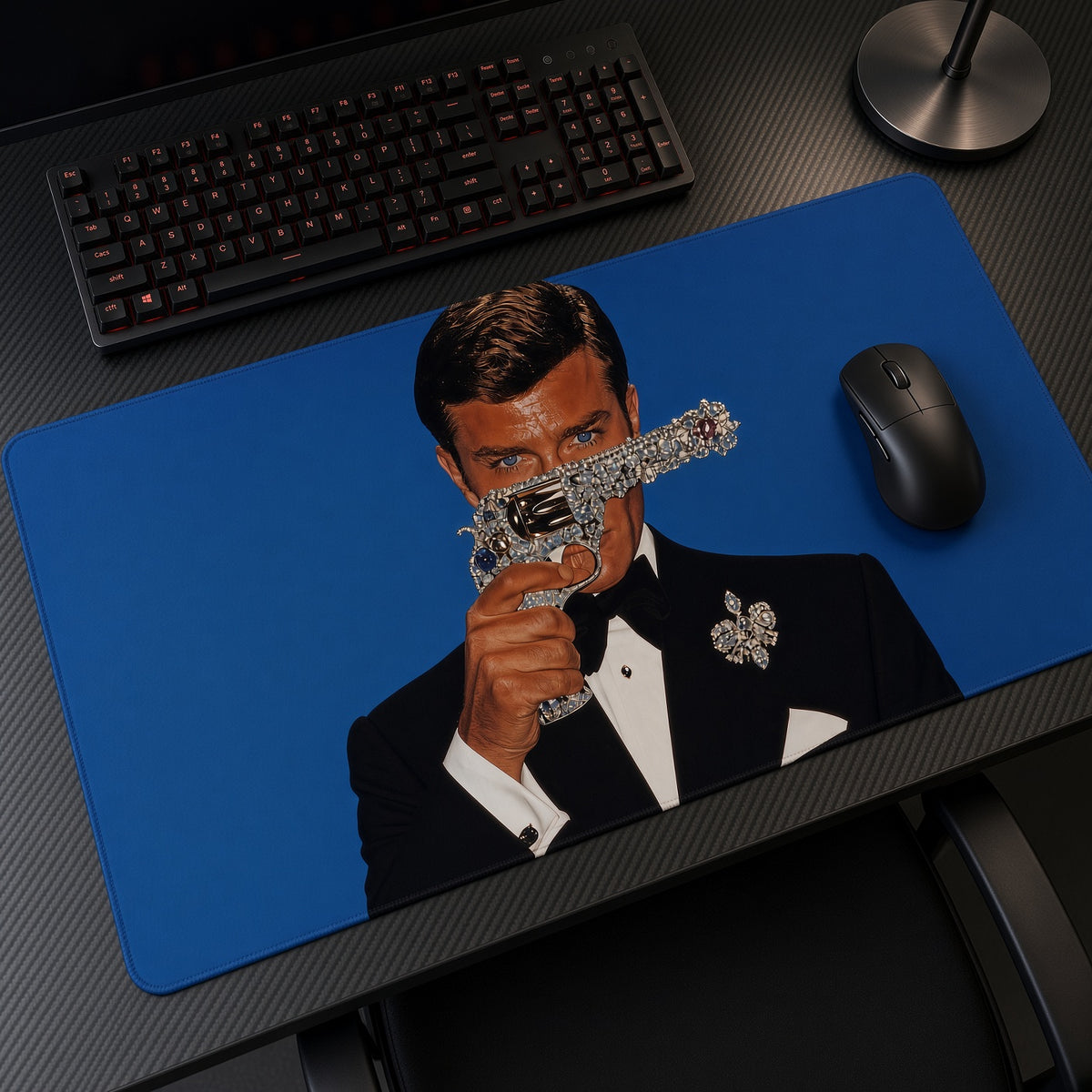 James Bond 007 Diamond Revolver Playmat at an angle with keyboard and mouse