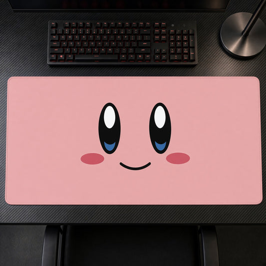 Kirby Star Warrior playmat on a gaming desk, top-down view