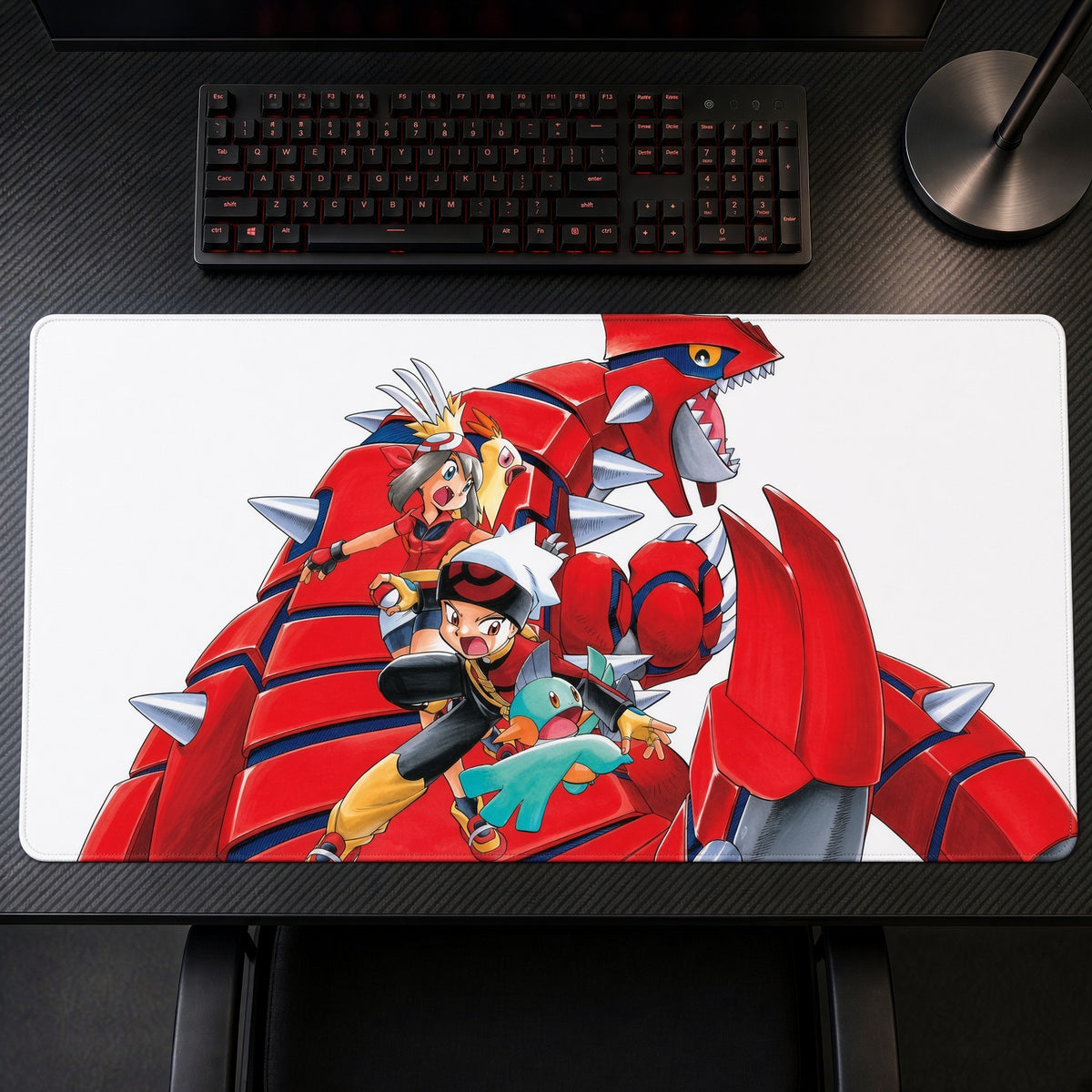 May, Brendan, Mudkip and Torchic with Groudon Pokémon Playmat on a gaming desk, top-down view