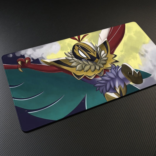 Mega Hawlucha Off The Top Rope playmat at an angle on a gaming desk