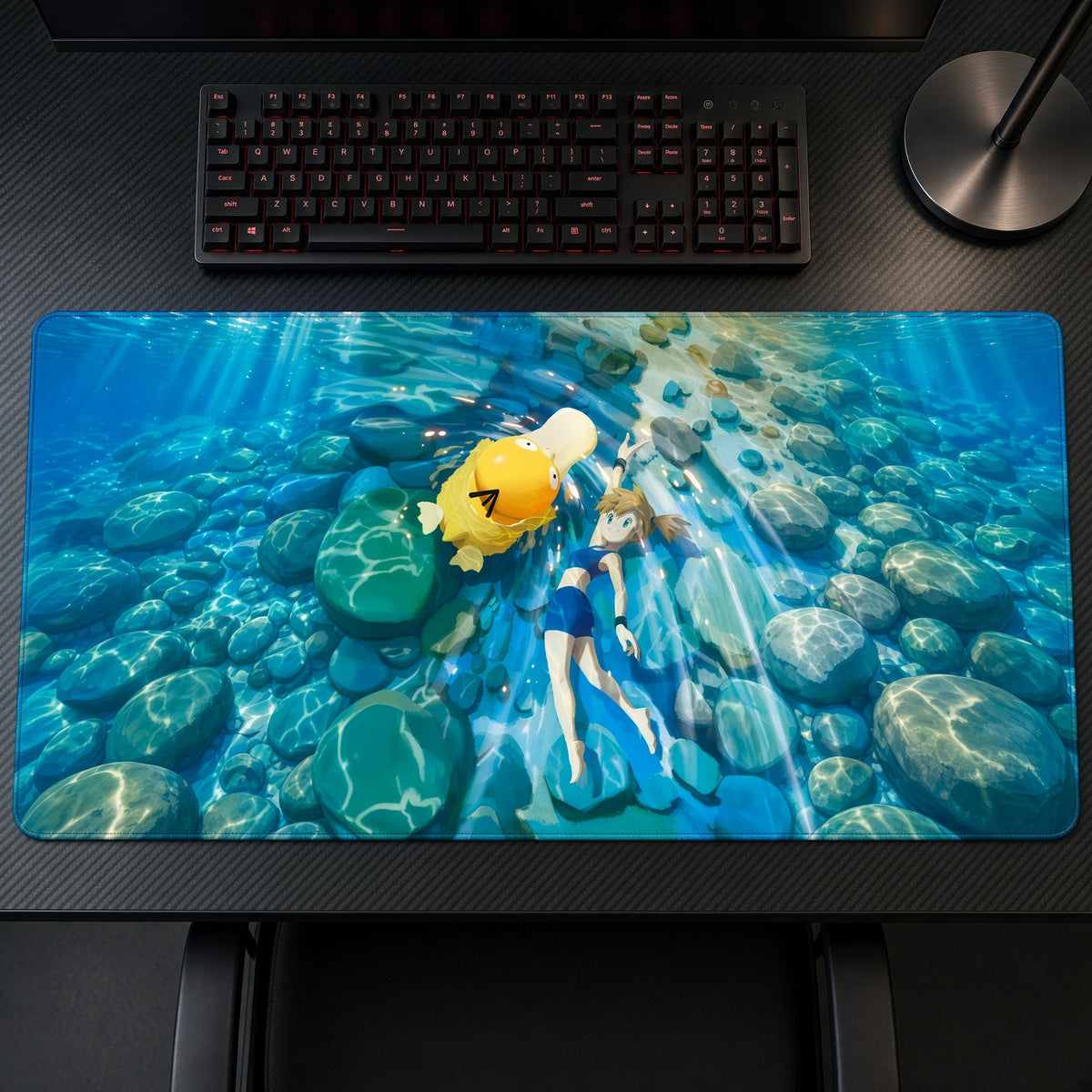 Misty and Psyduck Underwater Pokémon Playmat on a gaming desk, top-down view