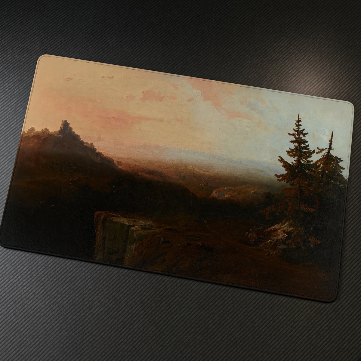 Mountain Scene Thomas Moran Playmat at an angle on a gaming desk