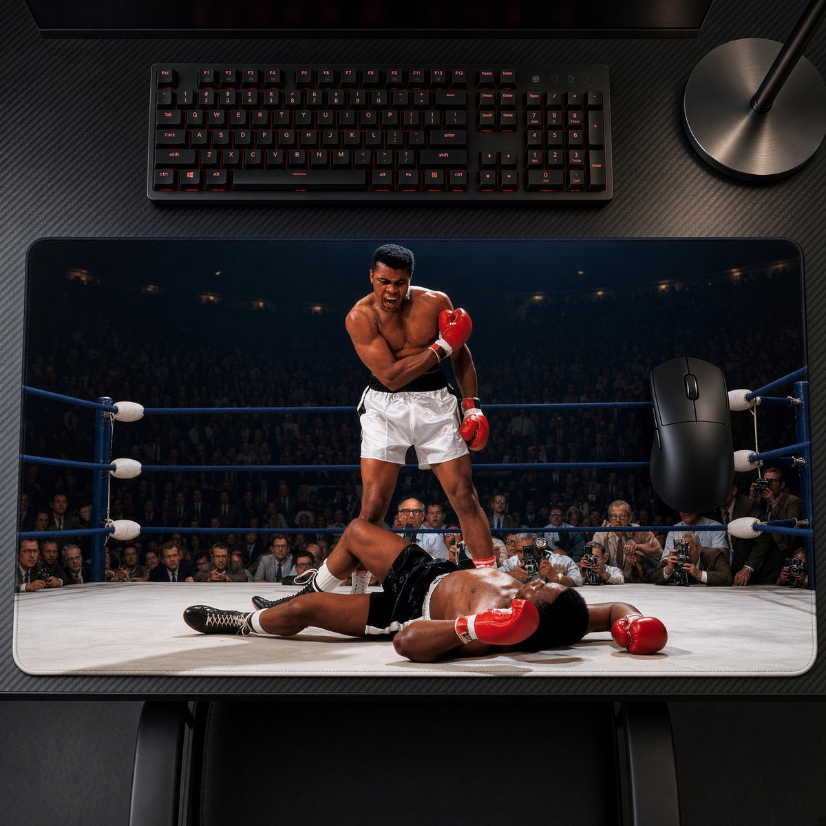 Muhammad Ali vs Liston Boxing Playmat on a gaming desk, top-down view