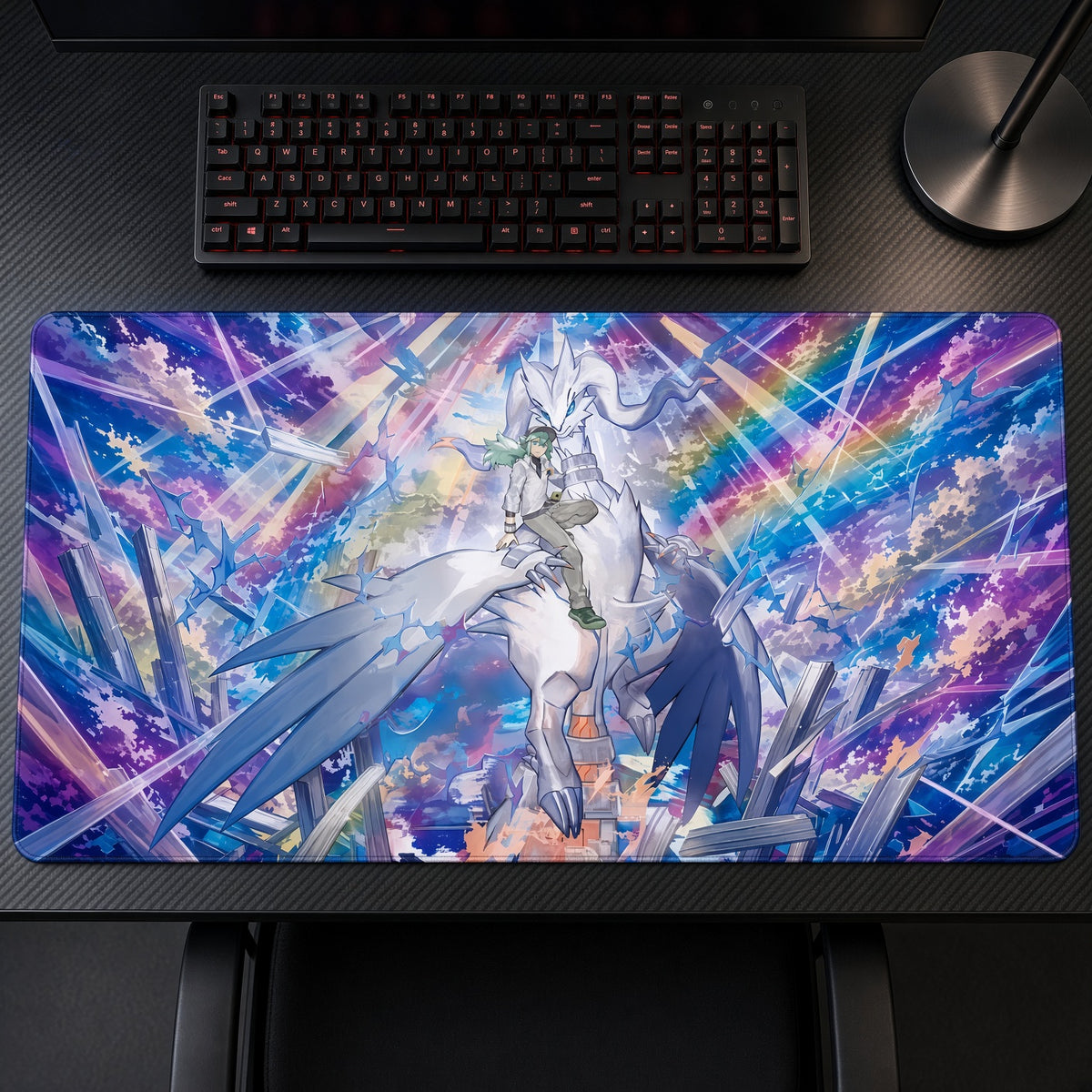 N and Reshiram Prism Light Pokémon Playmat on a gaming desk, top-down view