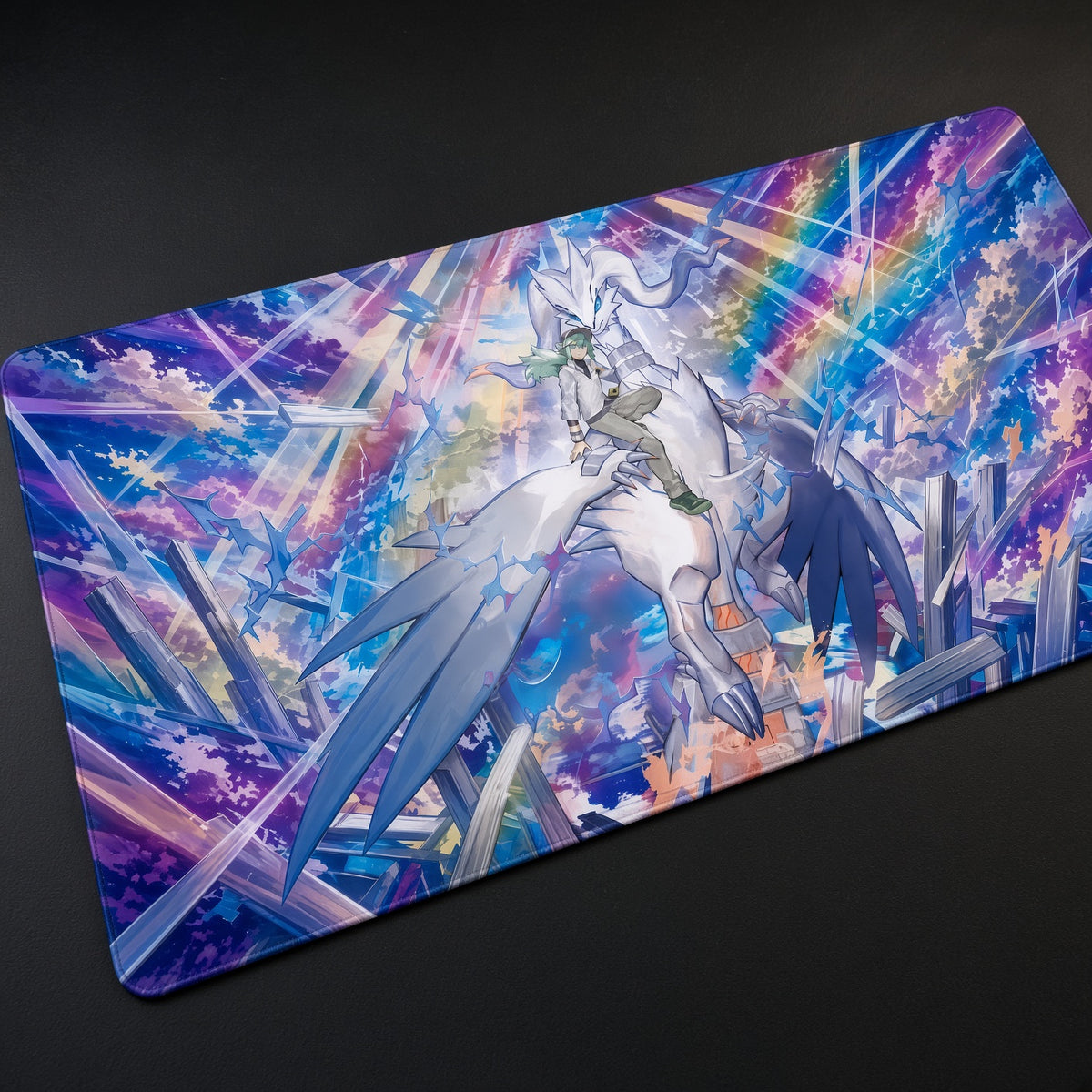 N and Reshiram Prism Light Pokémon Playmat at an angle on a gaming desk