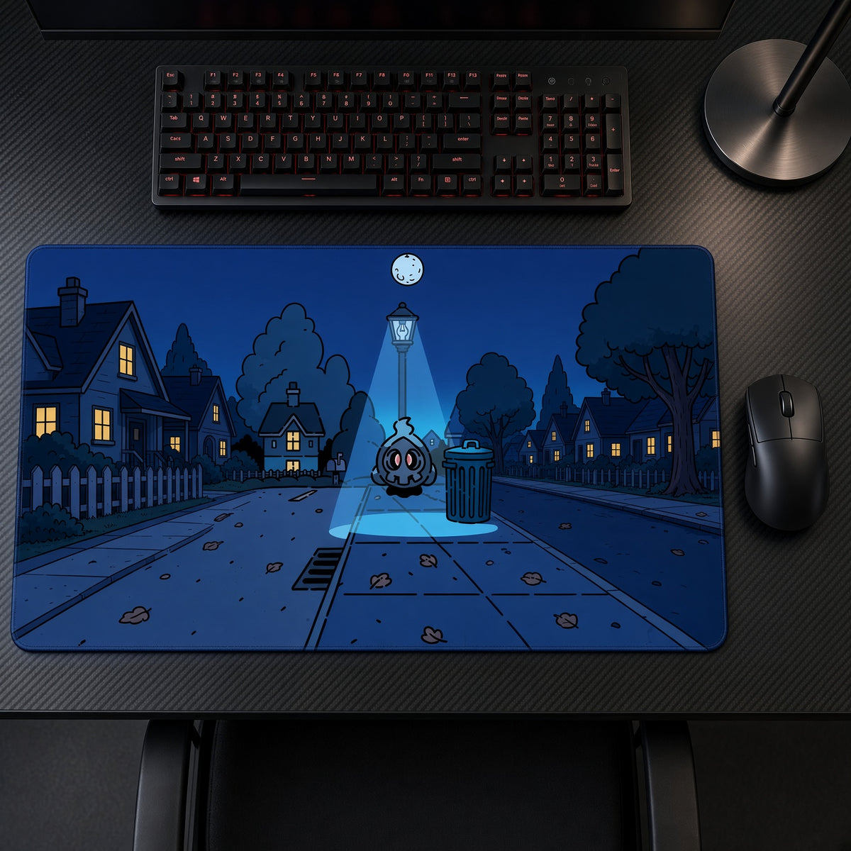 Duskull Night Street Pokémon Playmat on a gaming desk, top-down view