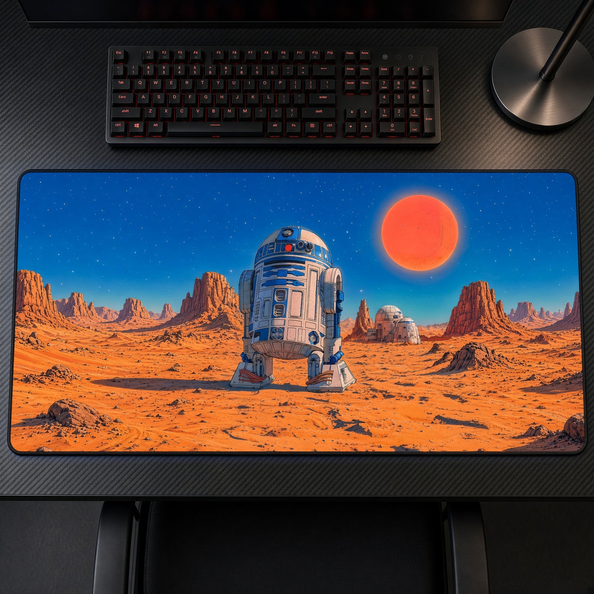 R2-D2 Desert Red Sun Star Wars Playmat on a gaming desk, top-down view
