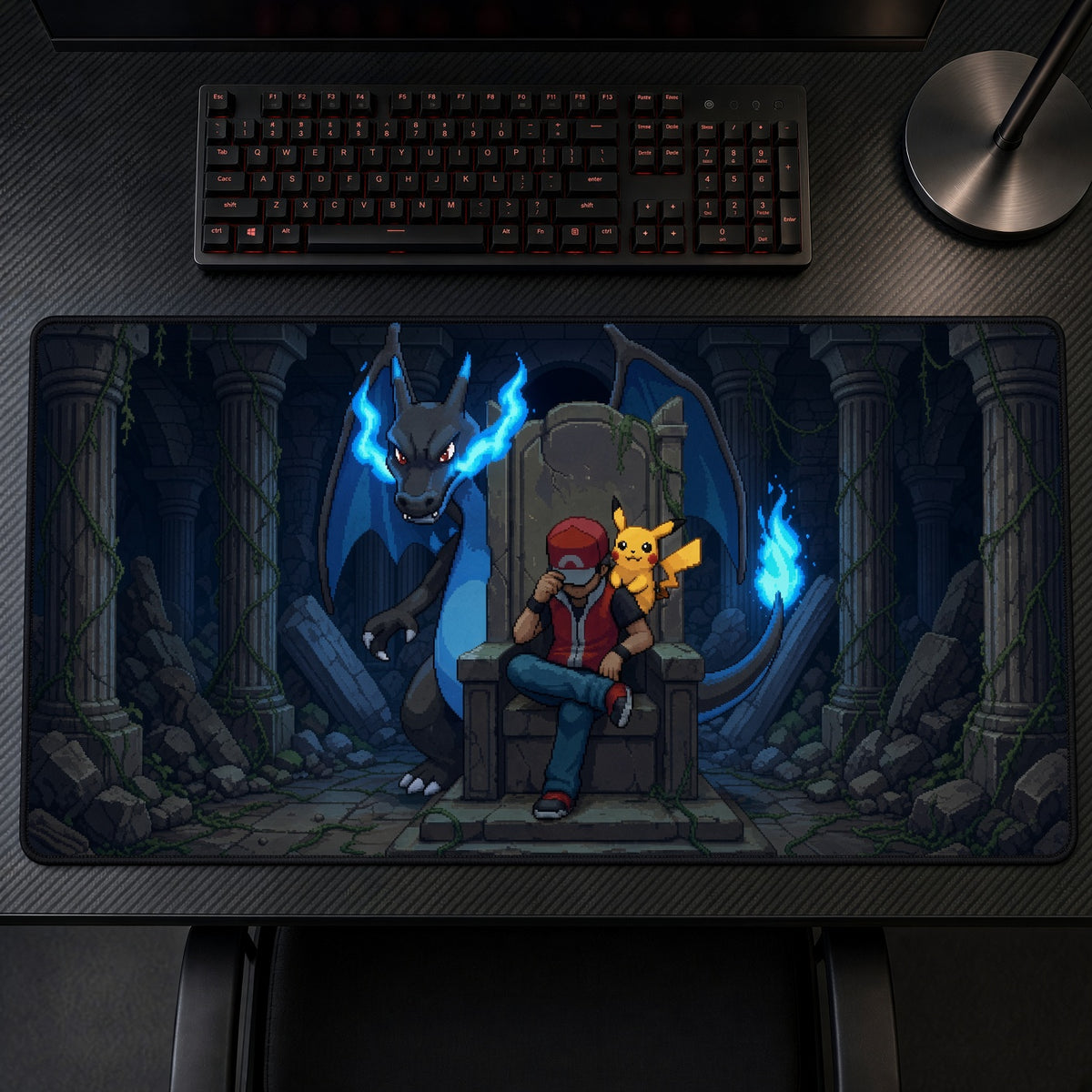 Red and Pikachu Dark Throne Pokémon Playmat on a gaming desk, top-down view