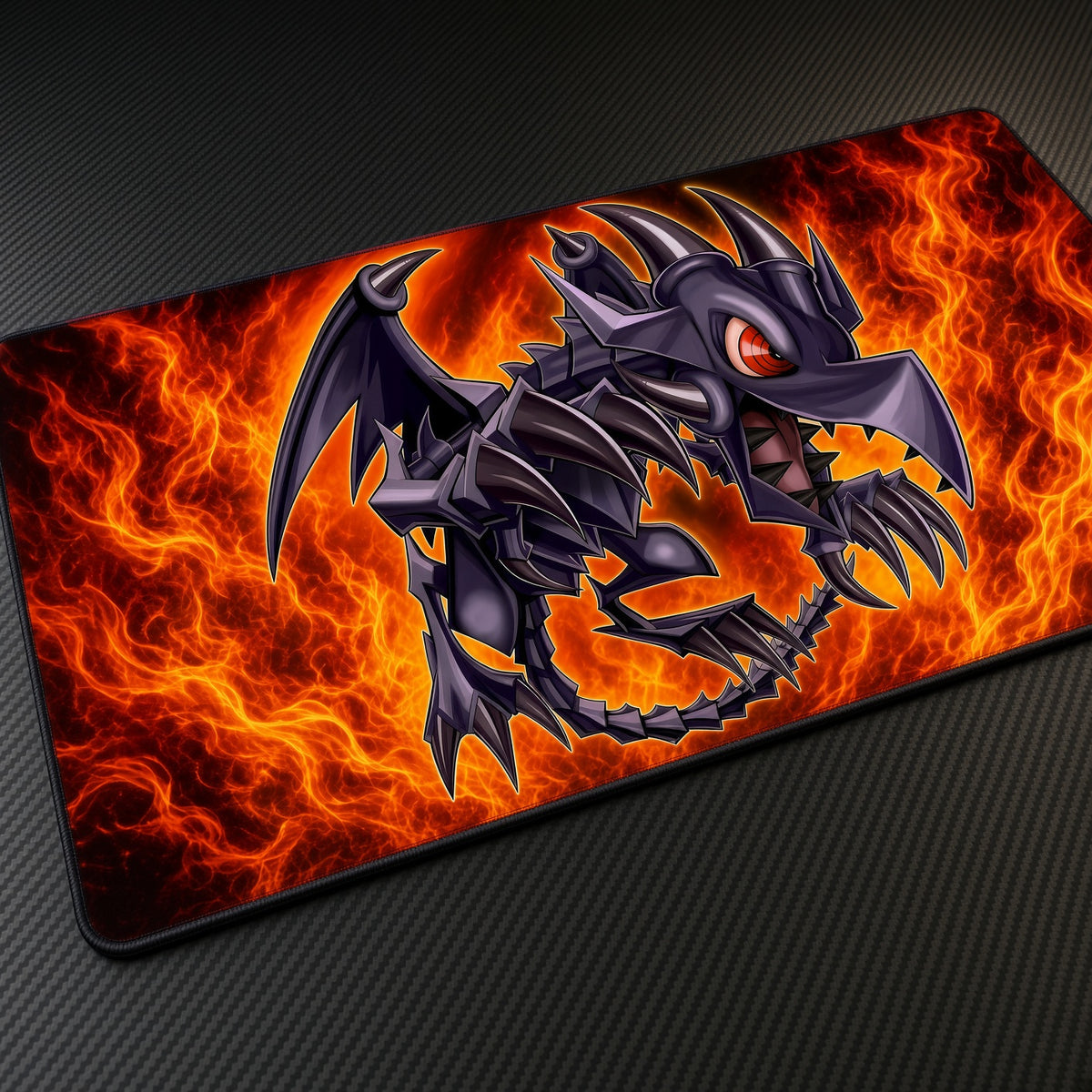 Red-Eyes Black Dragon Flames Yu-Gi-Oh! Playmat at an angle on a gaming desk