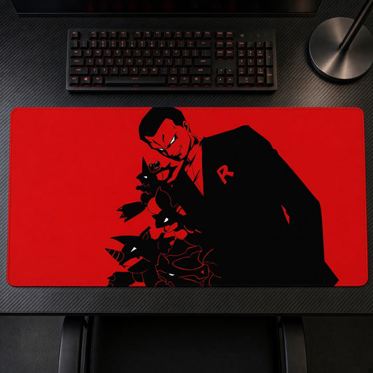Red Noir Boss Silhouette Playmat on a gaming desk, top-down view