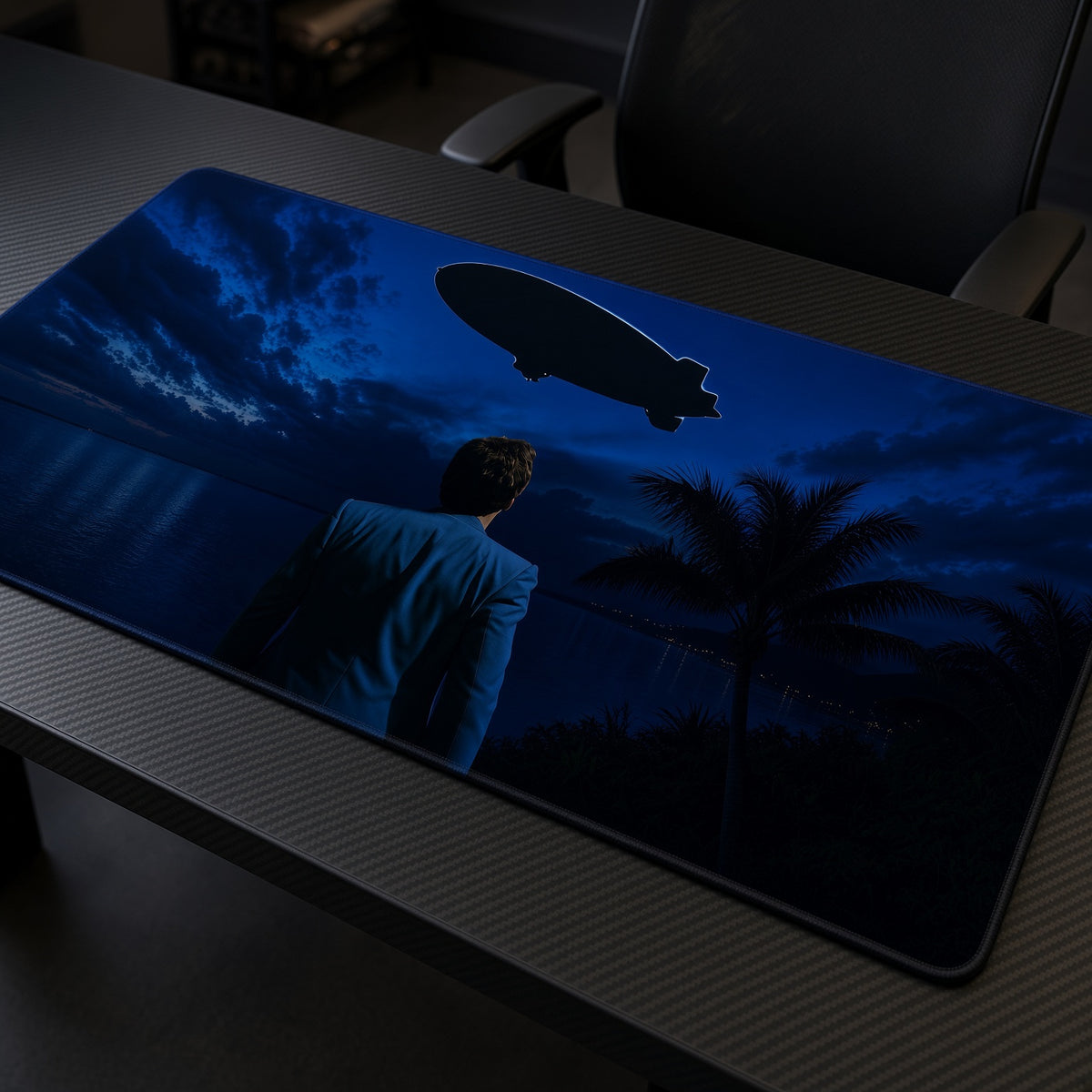 Scarface Blimp The World Is Yours Playmat at an angle on a gaming desk