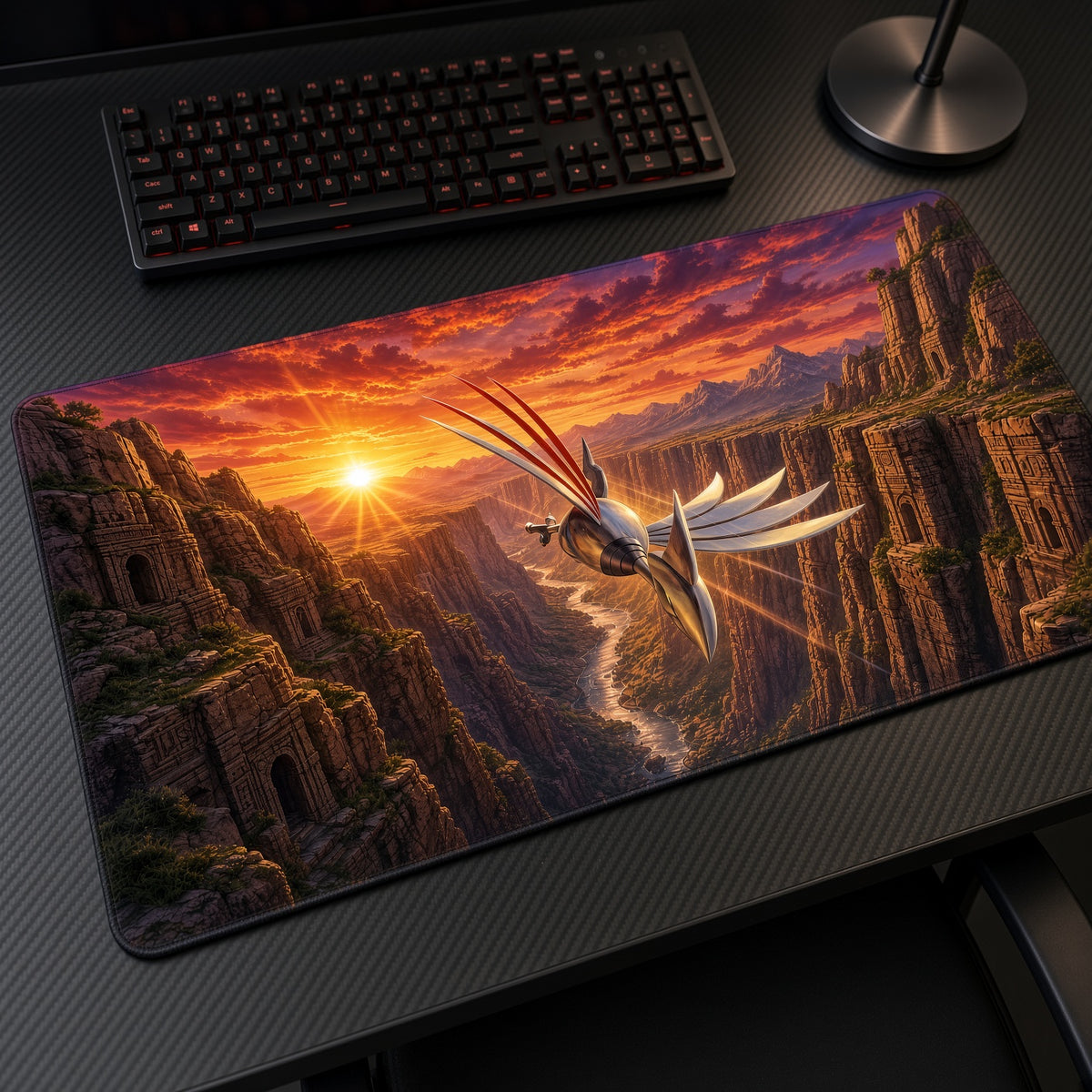 Skarmory Sunset Canyon Pokémon Playmat at an angle with keyboard and mouse