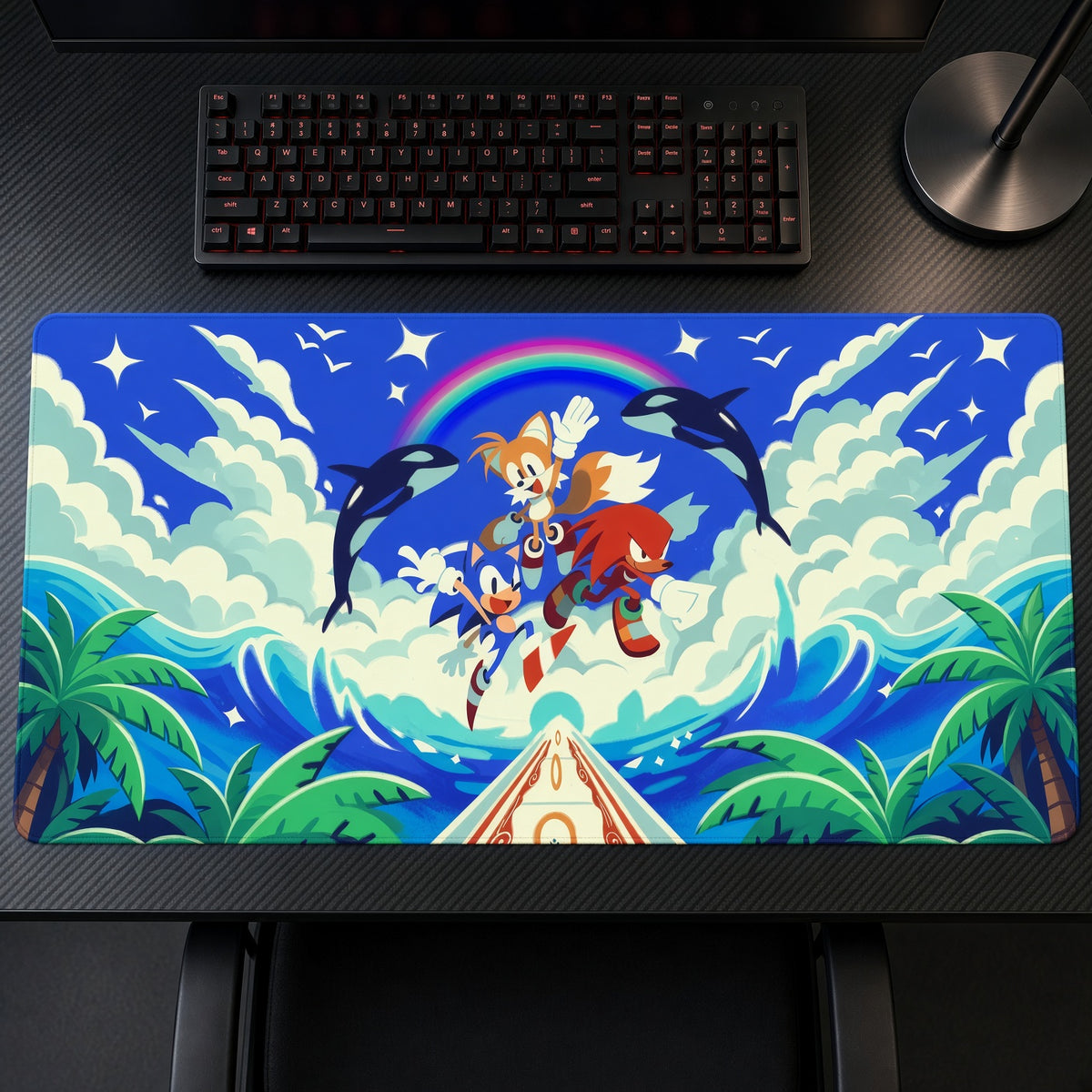 Sonic Tails and Knuckles Rainbow Road Sonic Playmat on a gaming desk, top-down view