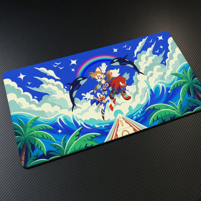 Sonic Tails and Knuckles Rainbow Road Sonic Playmat at an angle on a gaming desk