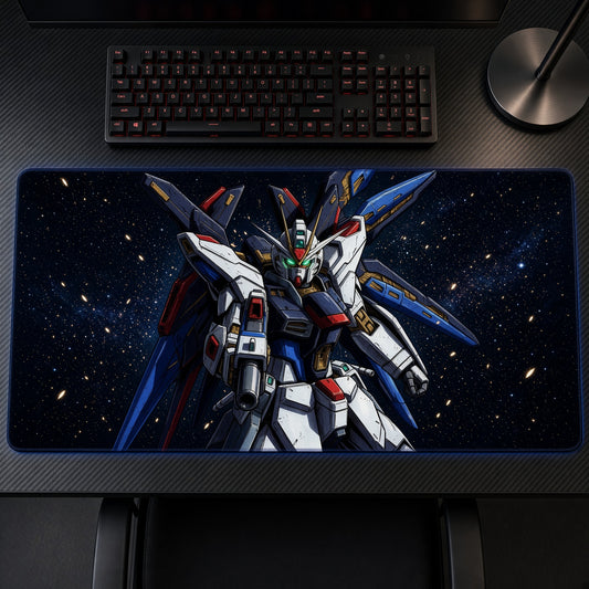 Strike Freedom Gundam Space Playmat on a gaming desk, top-down view