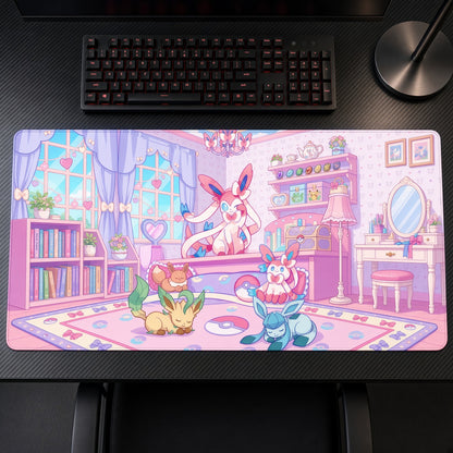 Sylveon Leafeon & Glaceon Eevee Room Pokémon Playmat on a gaming desk, top-down view