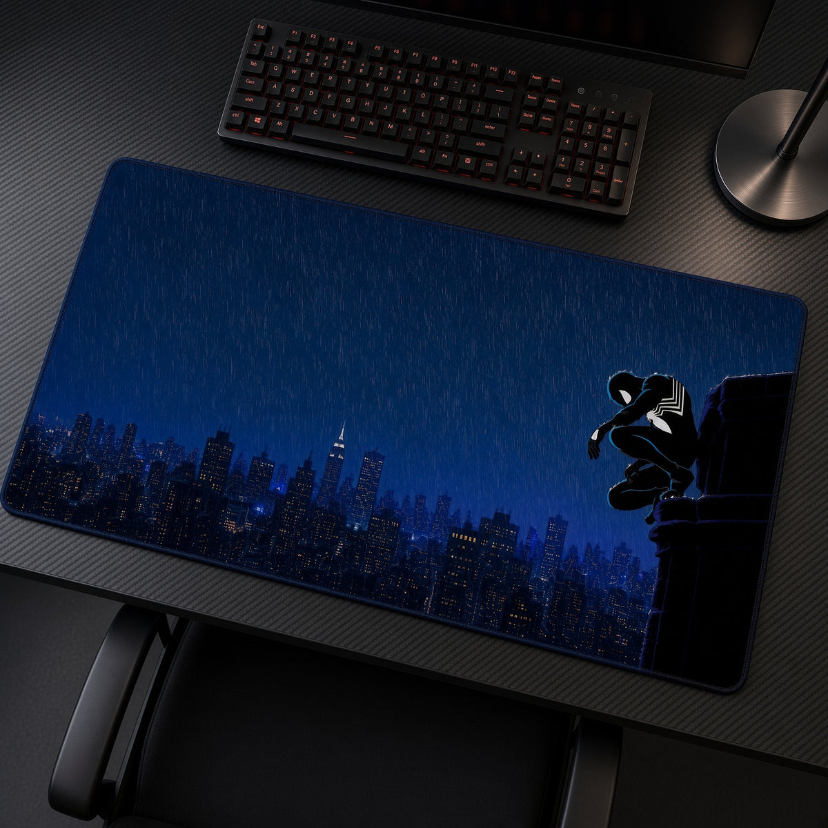 Symbiote Spider-Man Rain City Playmat at an angle on a gaming desk