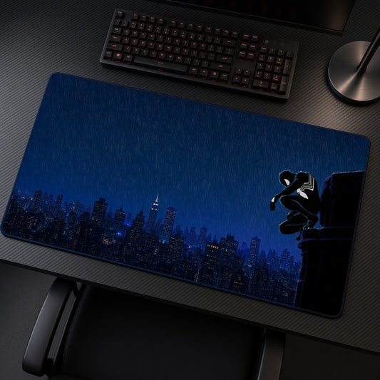 Symbiote Spider-Man Rain City Playmat at an angle on a gaming desk