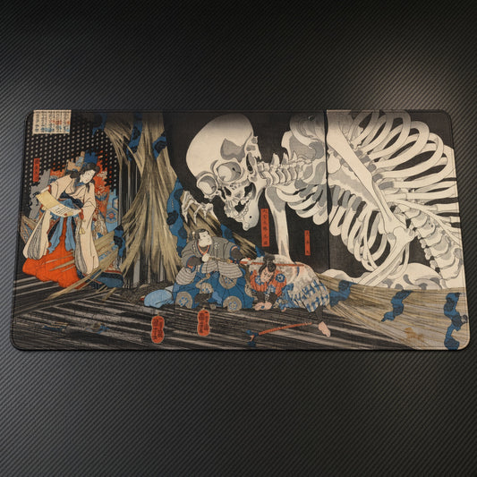 Takiyasha the Witch and the Skeleton Spectre (triptych) Utagawa Kuniyoshi Playmat on a gaming desk, top-down view