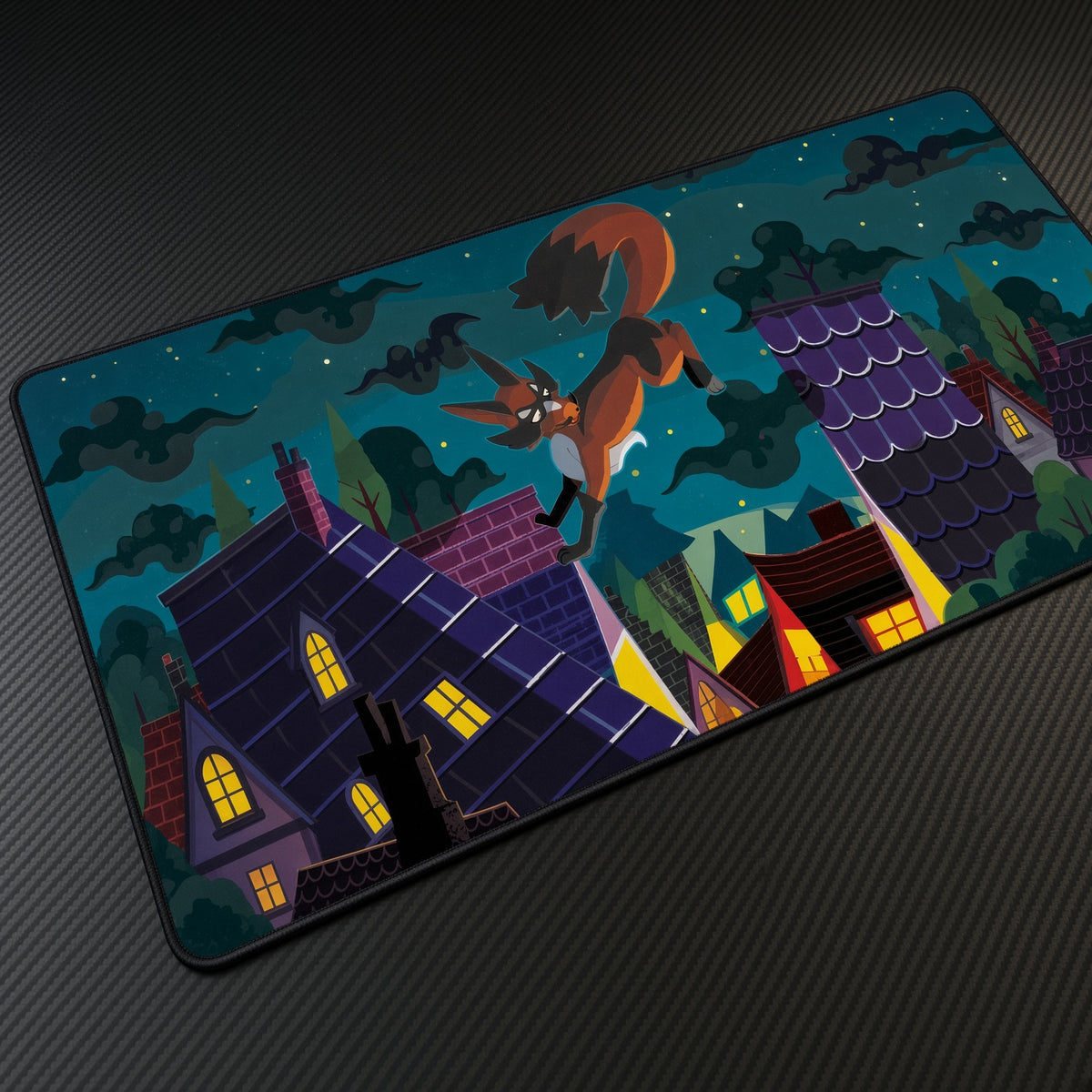Thievul Night Village Pokémon Playmat at an angle with keyboard and mouse
