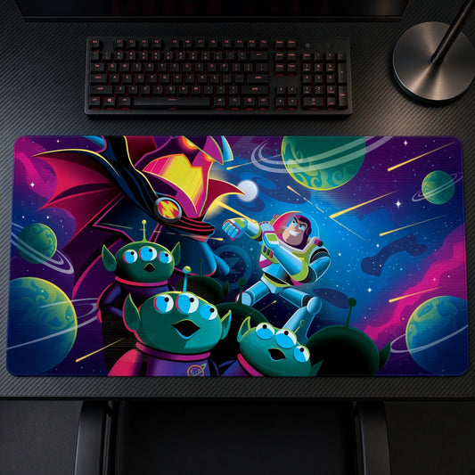 Toy Story Aliens and Buzz Lightyear Space Playmat on a gaming desk, top-down view