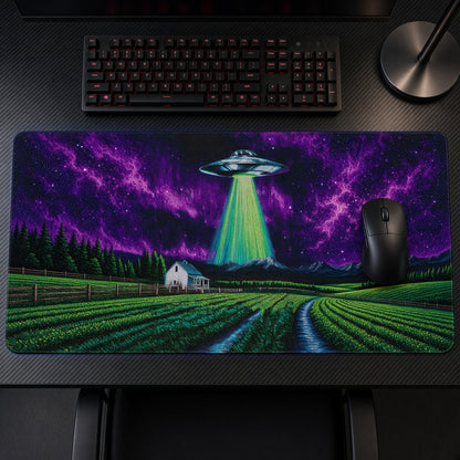 UFO Abduction Farm Night Playmat on a gaming desk, top-down view