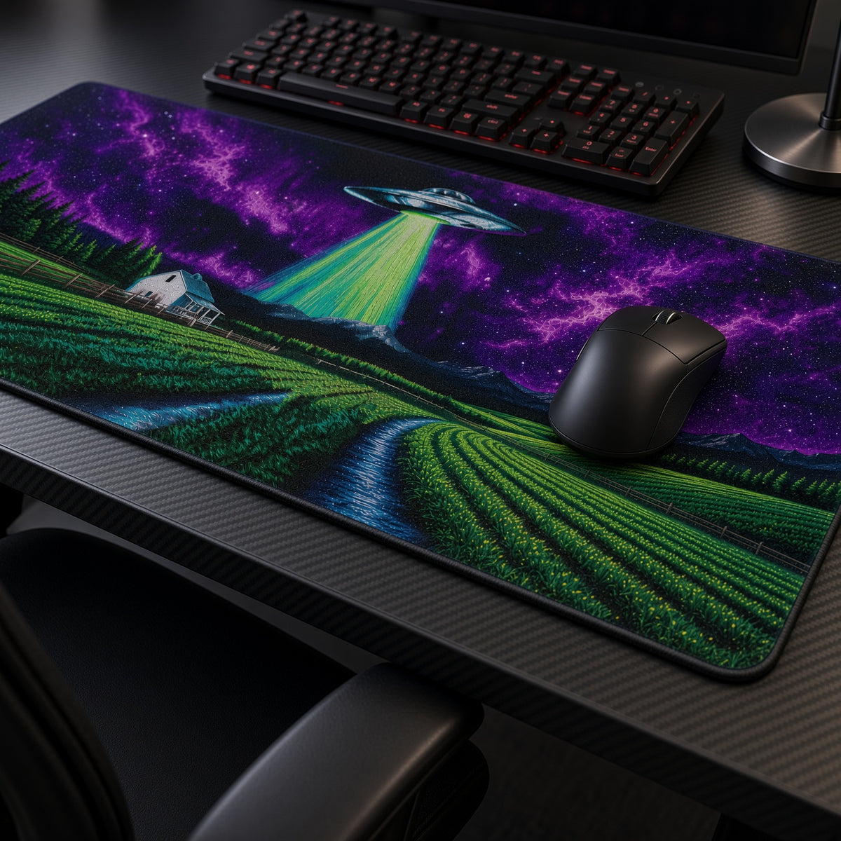 UFO Abduction Farm Night Playmat at an angle with keyboard and mouse