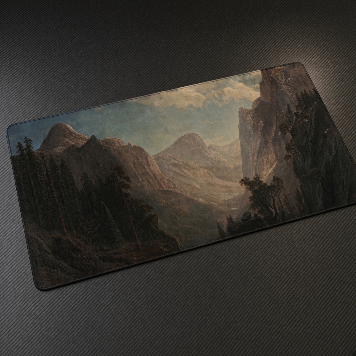 View in the Yosemite Valley Albert Bierstadt Playmat at an angle on a gaming desk