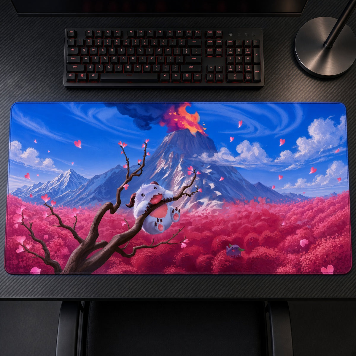 Volcano Pink Blossom Landscape Playmat on a gaming desk, top-down view