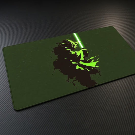Yoda Green Lightsaber Star Wars Playmat at an angle on a gaming desk