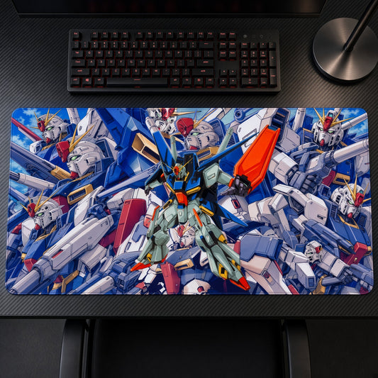 ZZ Gundam Mobile Suit Collage Playmat on a gaming desk, top-down view